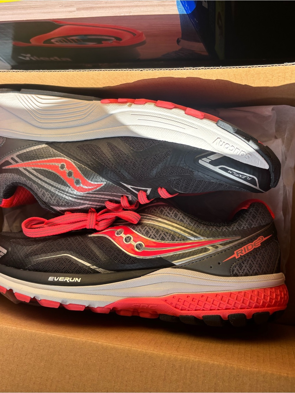 Saucony Ride 9 Sneakers in Black and Red